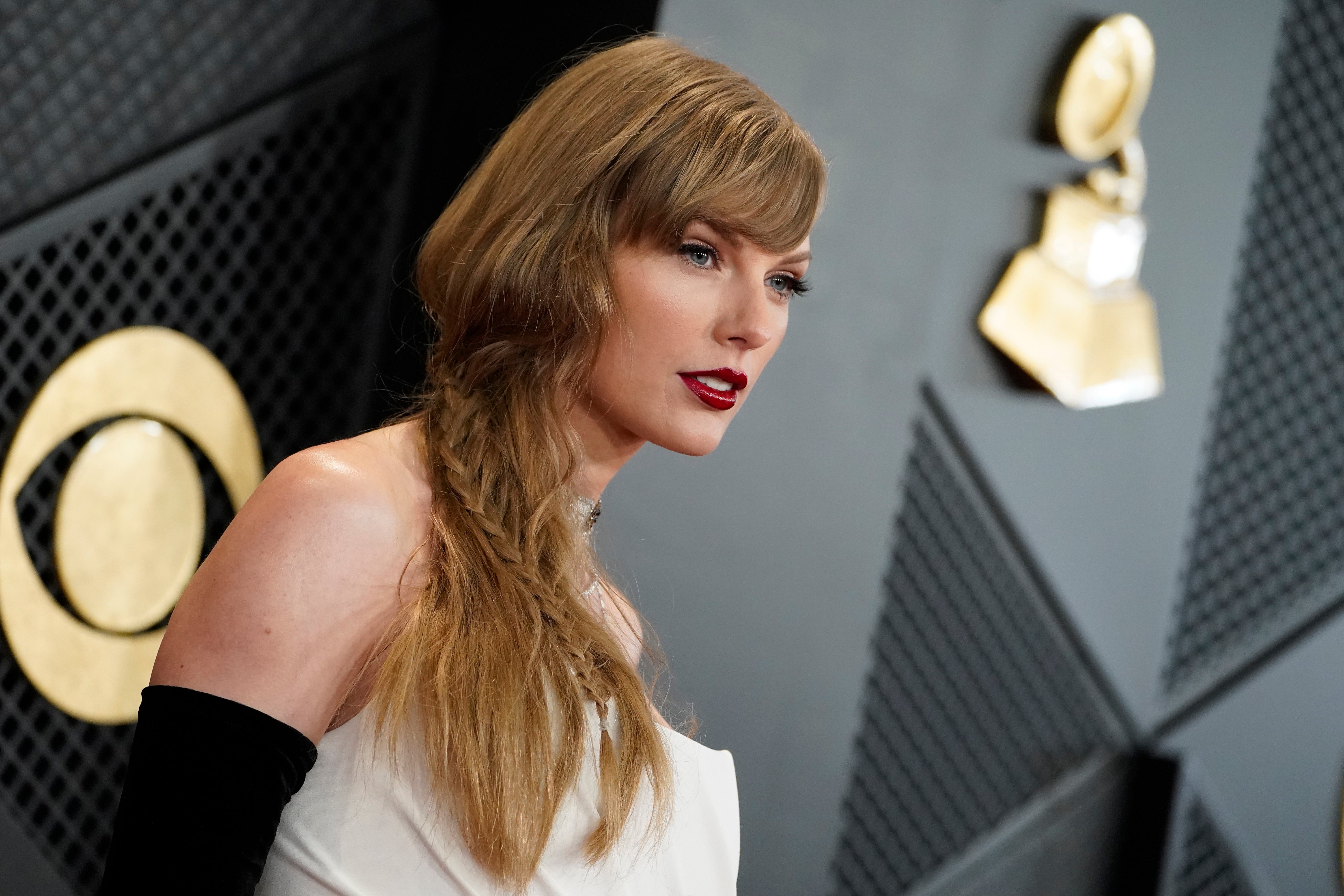 FILE - Taylor Swift arrives at the 66th annual Grammy Awards
