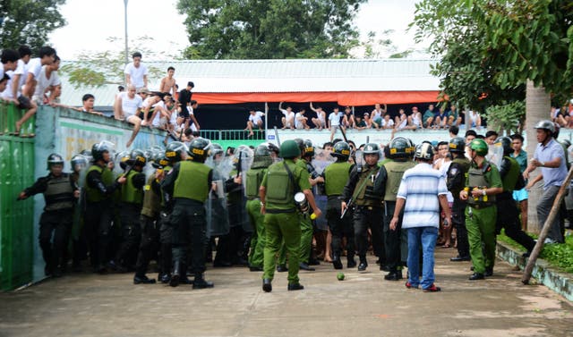 <p>File Policemen try to prevent drug addicts from escaping a compulsory rehabilitation centre in the southern province of Dong Nai in 2016</p>
