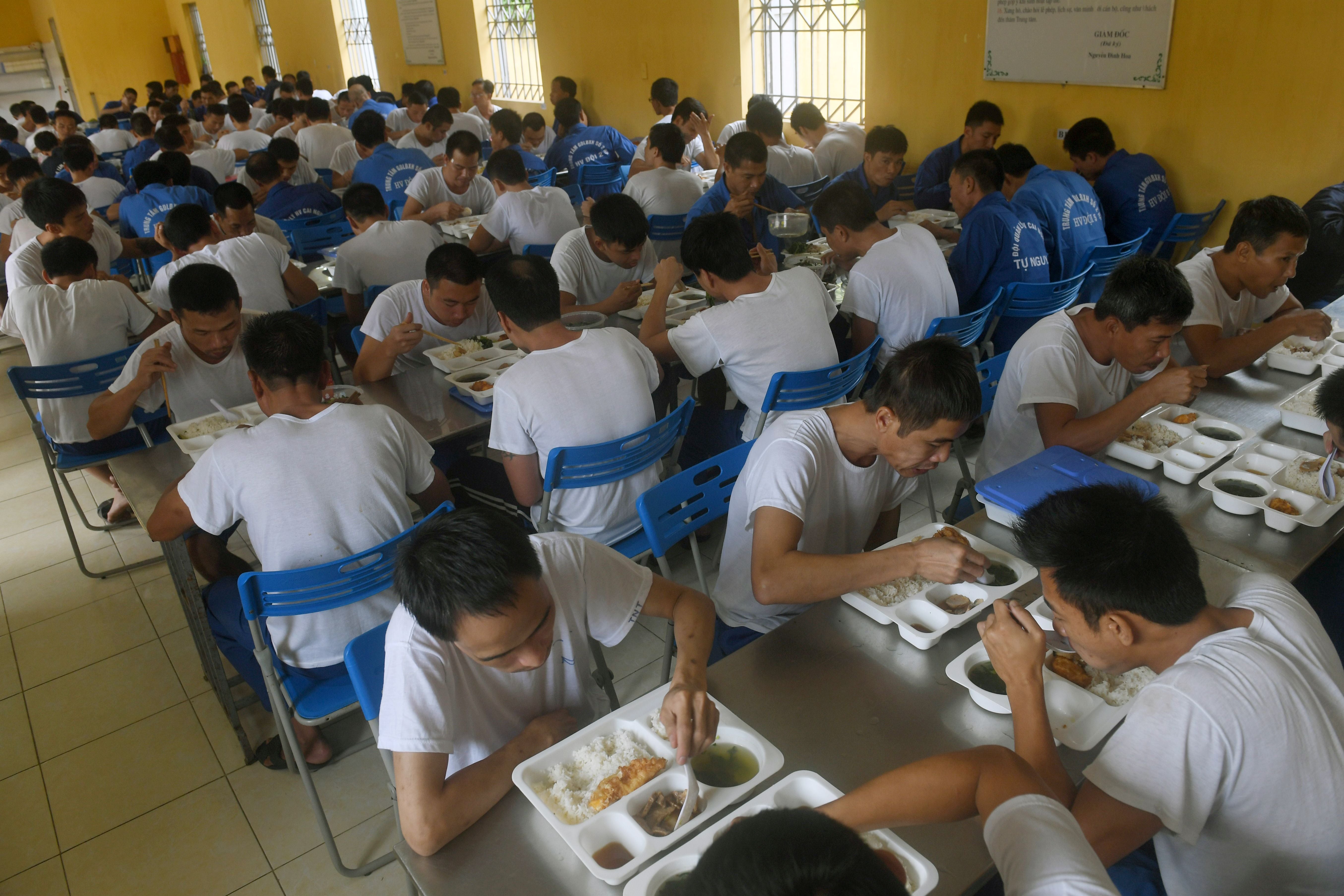 Inmates eating lunch in the dining hall of a drug rehabilitation centre in the northern city of Hai Phong in a picture taken on 16 November 2017