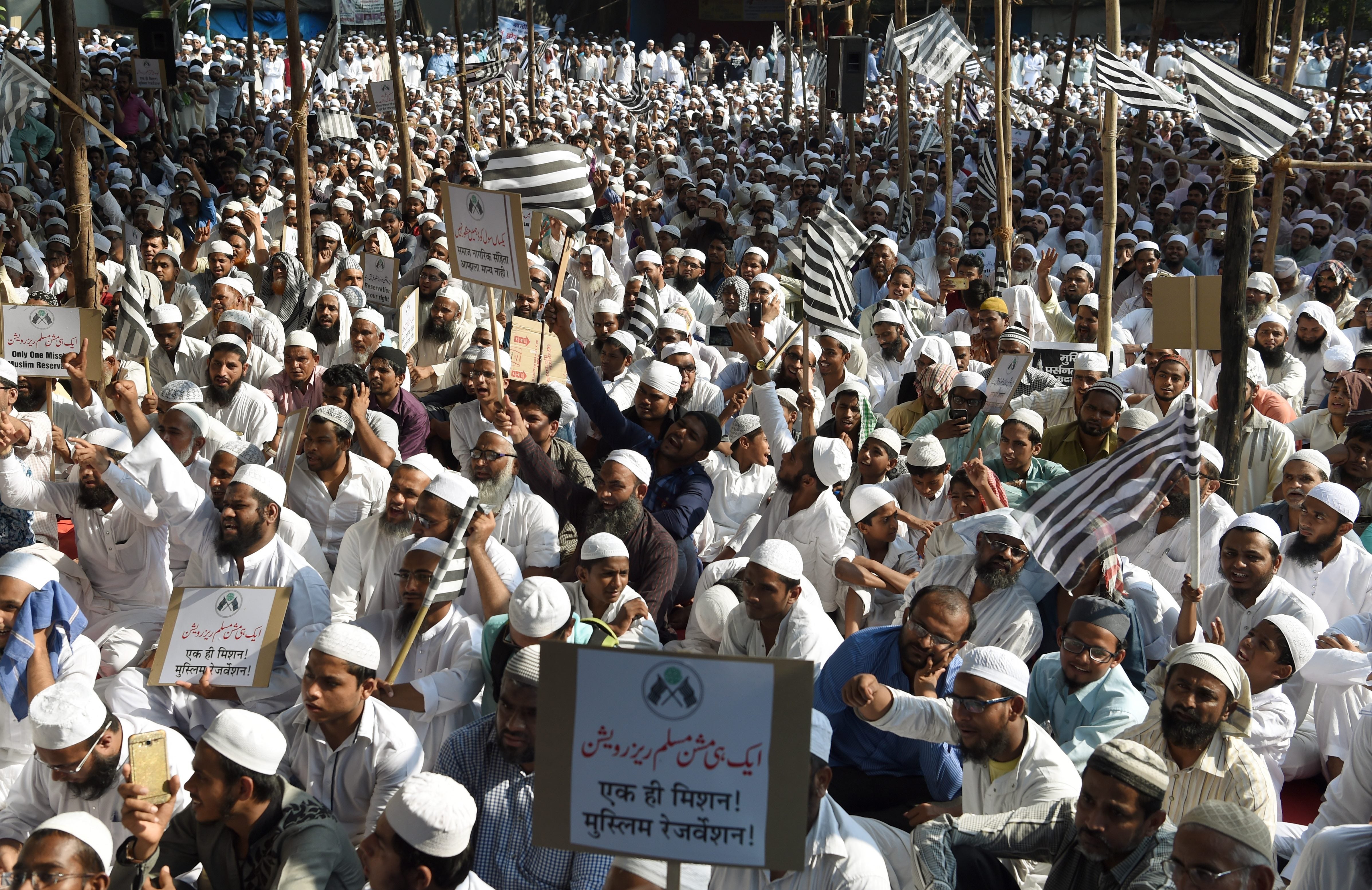 Indian Muslims take part in a protest rally against the implementation of a uniform civil code, in Mumbai in October 2016