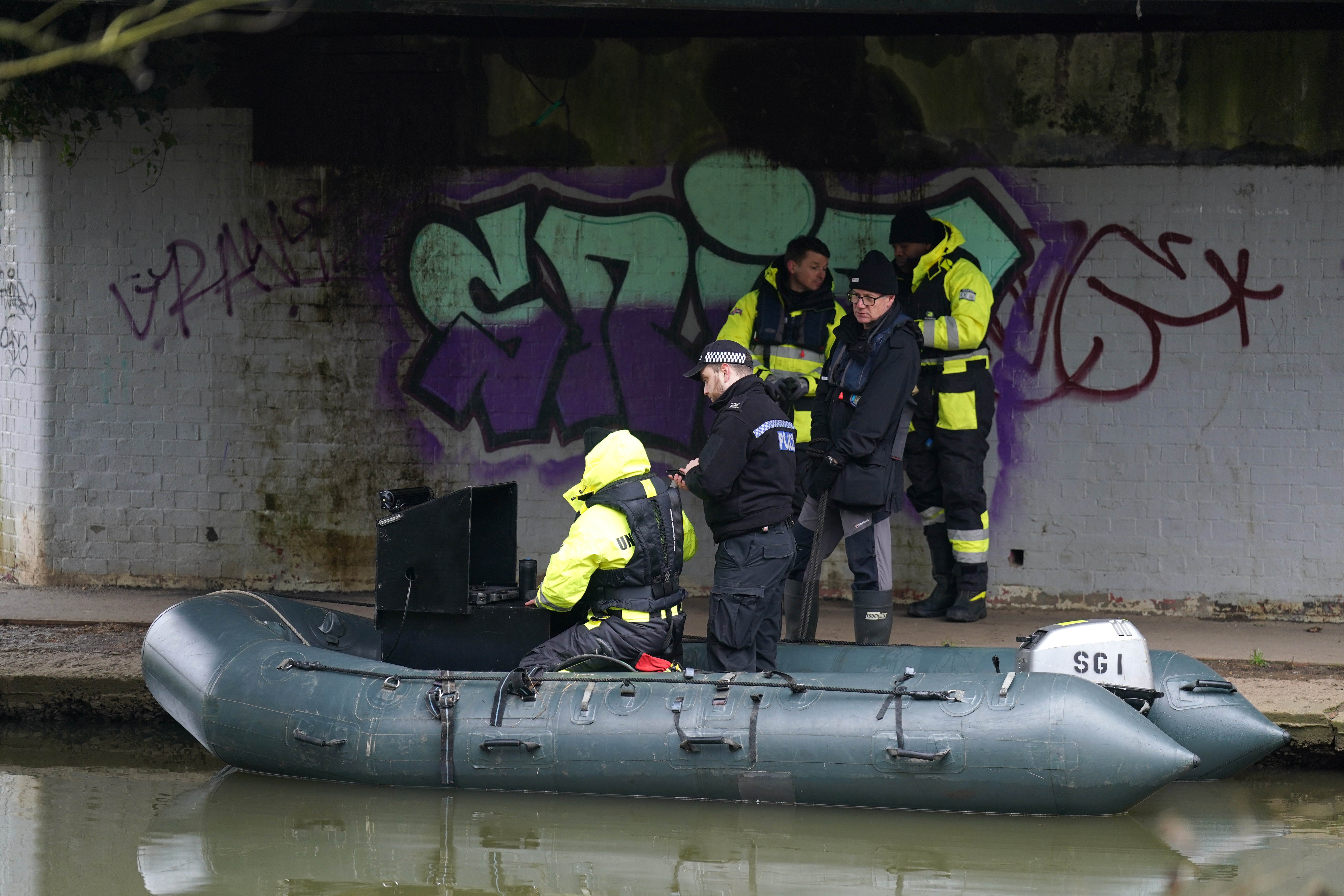 Specialist Group International stop underneath a bridge on the River Soar as they search for missing two-year-old Xielo Maruziva
