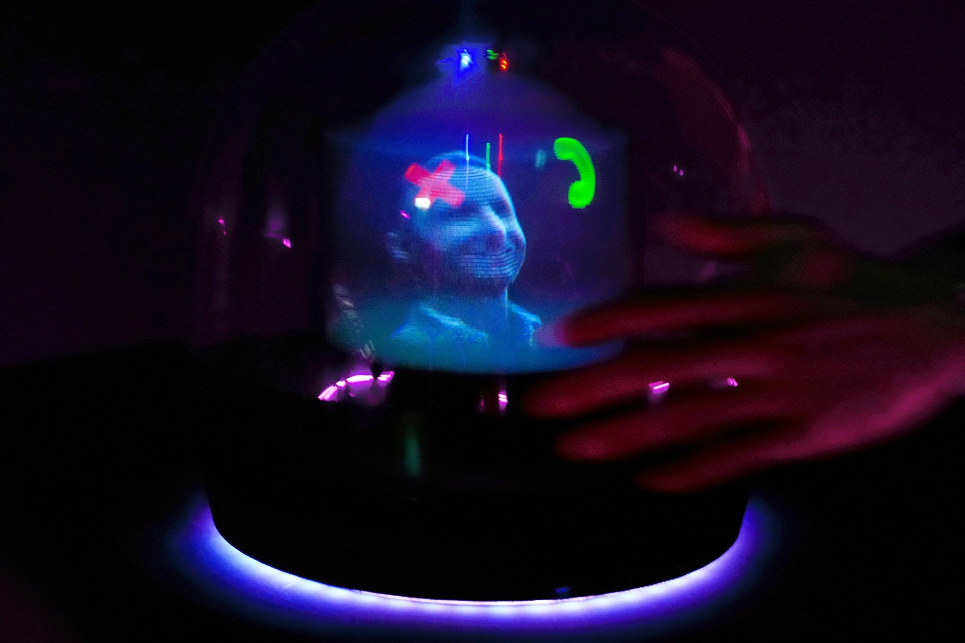 An AI-generated hologram called ‘Conceptt’ flagging a video-call is displayed at the Deutsche Telekom AG’s stand during Mobile World Congress (MWC) in Barcelona on 26 February, 2024