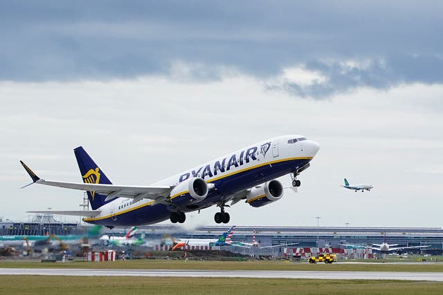 Ryanair has agreed to a deal with On the Beach to offer its flights on the holiday platform (Brian Lawless/PA)