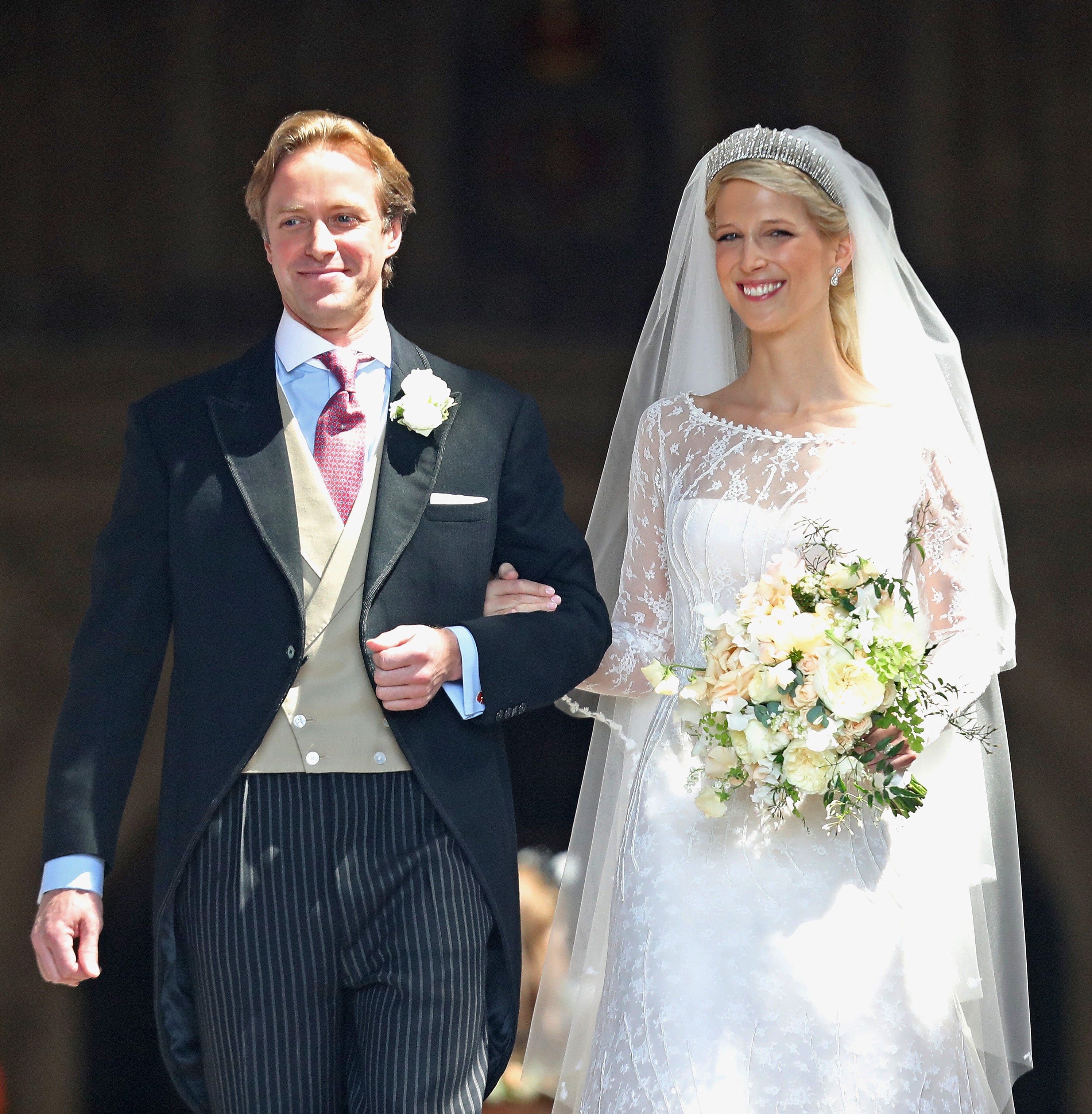 On the steps of the chapel after their wedding