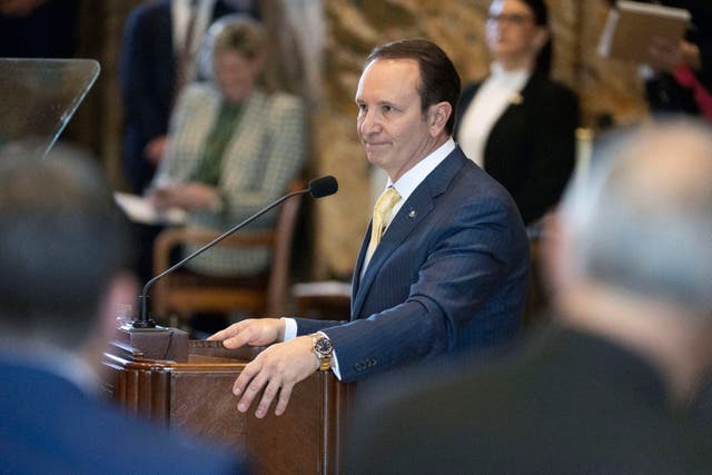 <p>Jeff Landry pauses during a standing ovation as he addresses members of the House and Senate on opening day of a legislative special session focusing on crime, 19 February 2024, in the House Chamber at the State Capitol in Baton Rouge</p>
