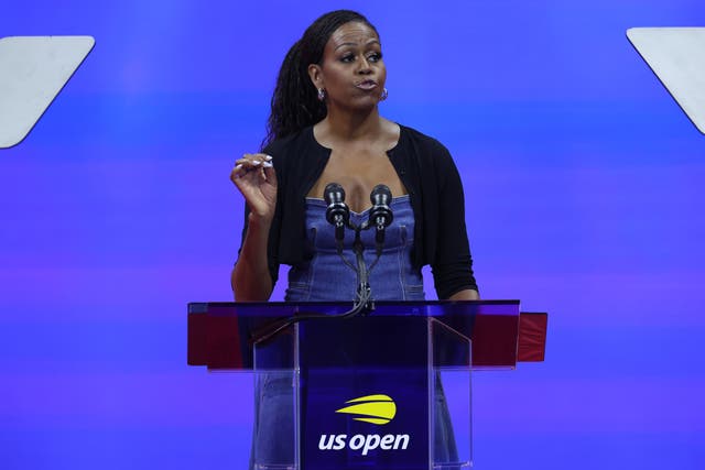 <p>Former first lady of the United States Michelle Obama speaks during a ceremony honoring 50 years of equal pay at the US Open</p>