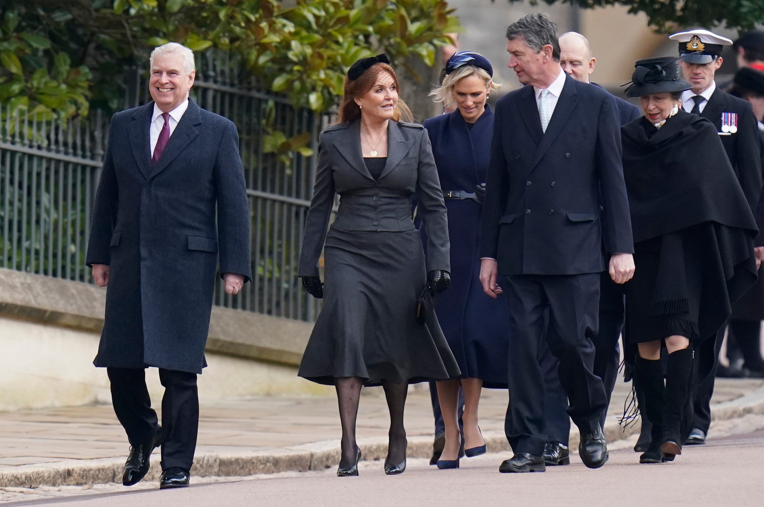 Prince Andrew (left) leads the line alongside Sarah, Duchess of York Duchess of York, Zara Tindall, Sir Timothy Laurence, Mike Tindall and Anne, Princess Royal at a meorial service for the late King Constantine of Greece