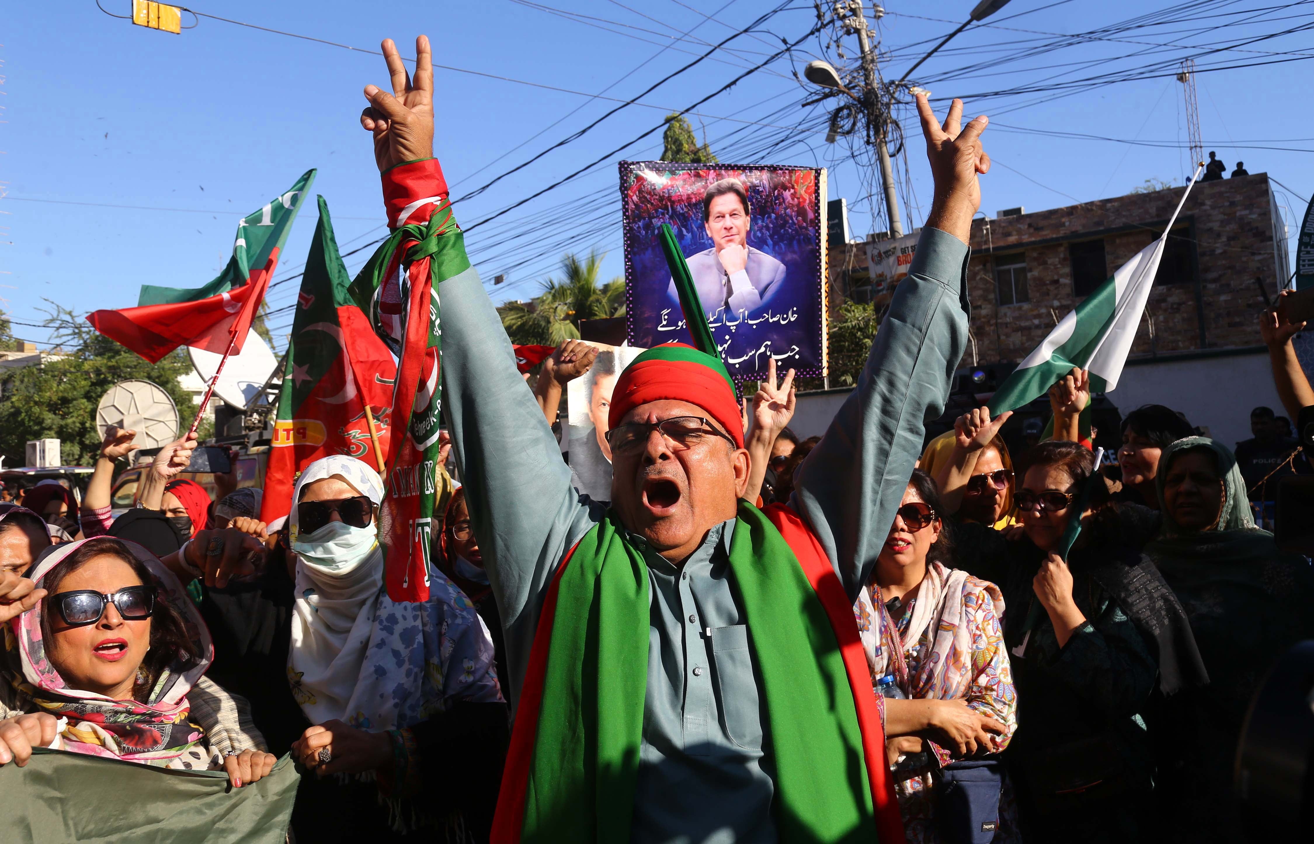 Supporters of Imran Khan's PTI party protest against alleged rigging in general elections in Karachi