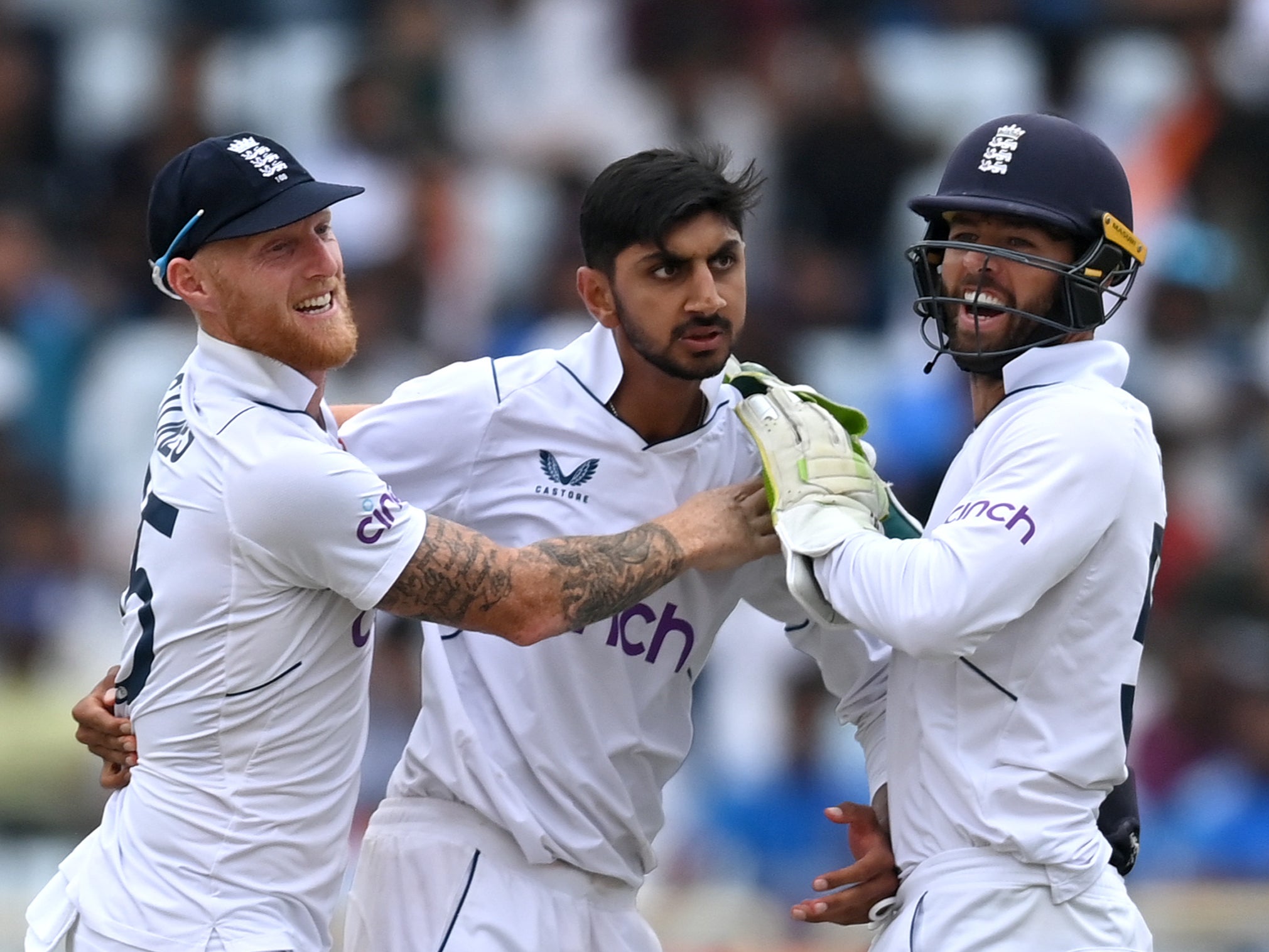 Shoaib Bashir of England celebrates with captain Ben Stokes and Ben Foakes after taking Rajat Patidar’s wicket in Ranchi