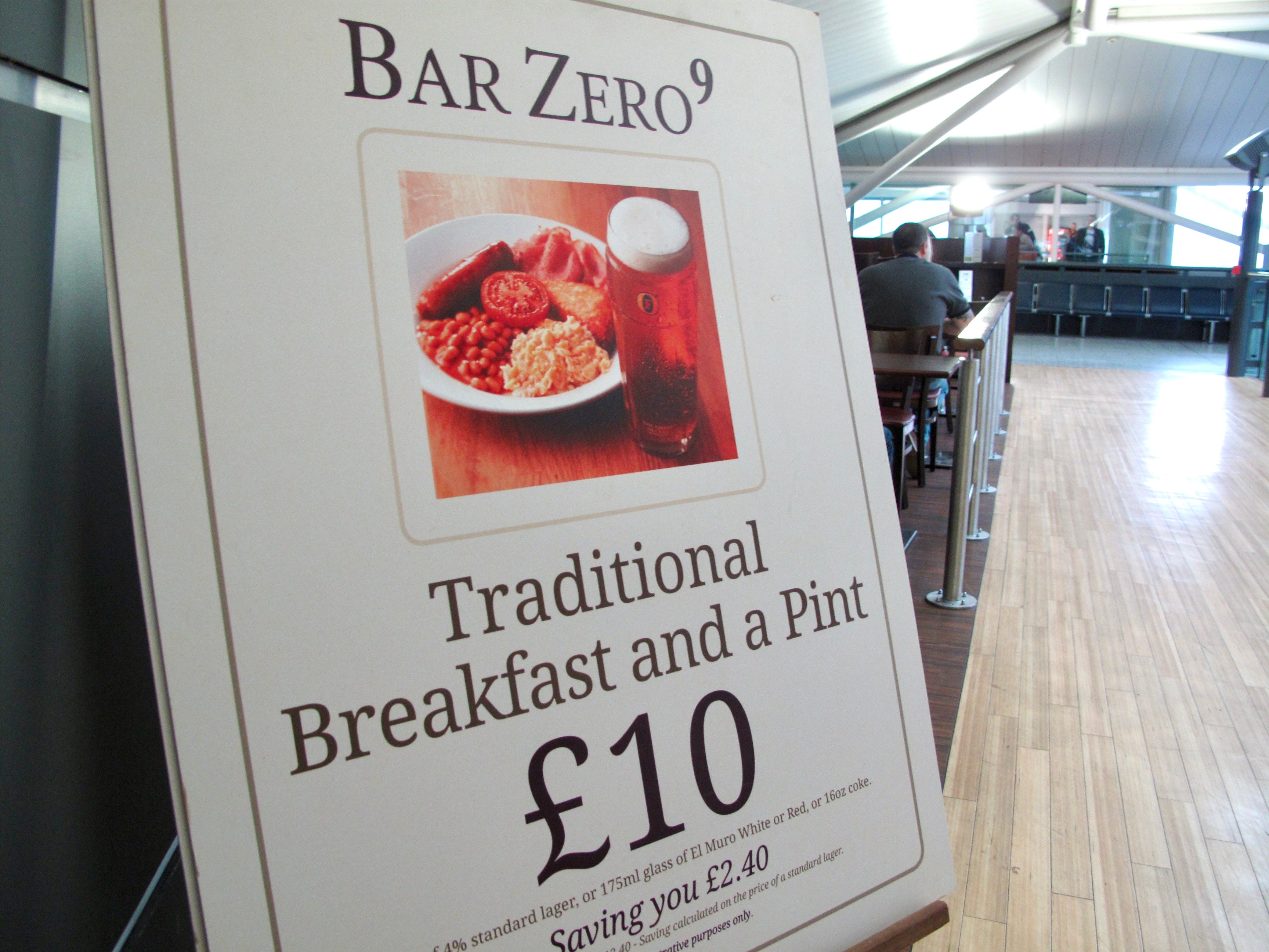 Good start? Poster at Bristol airport offering breakfast and a pint (file photo)