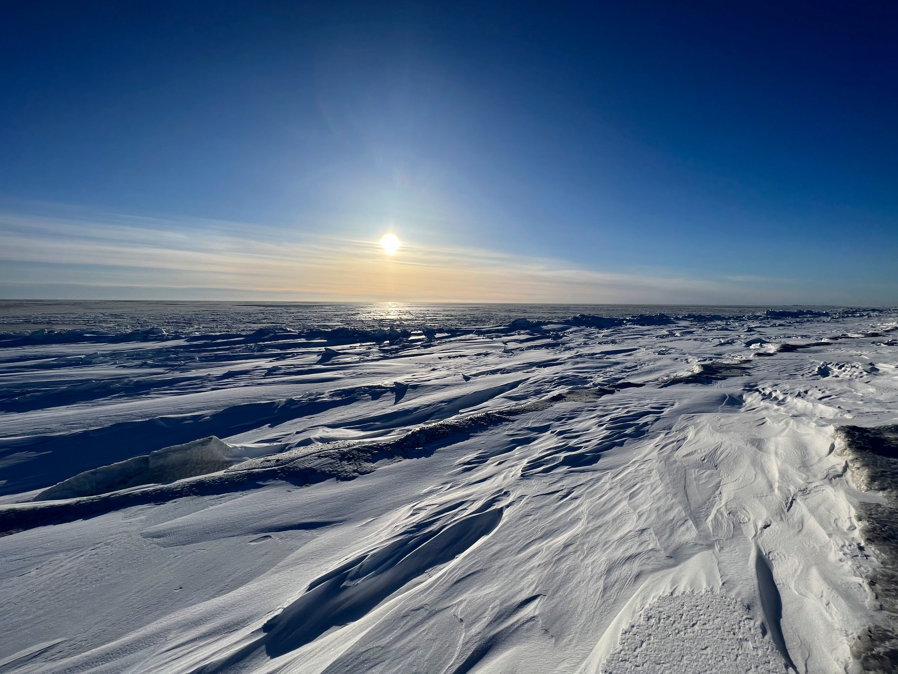 The sun sets outside of the northwest Alaska village of Point Hope on the Chukchi Sea, 21 February 2024