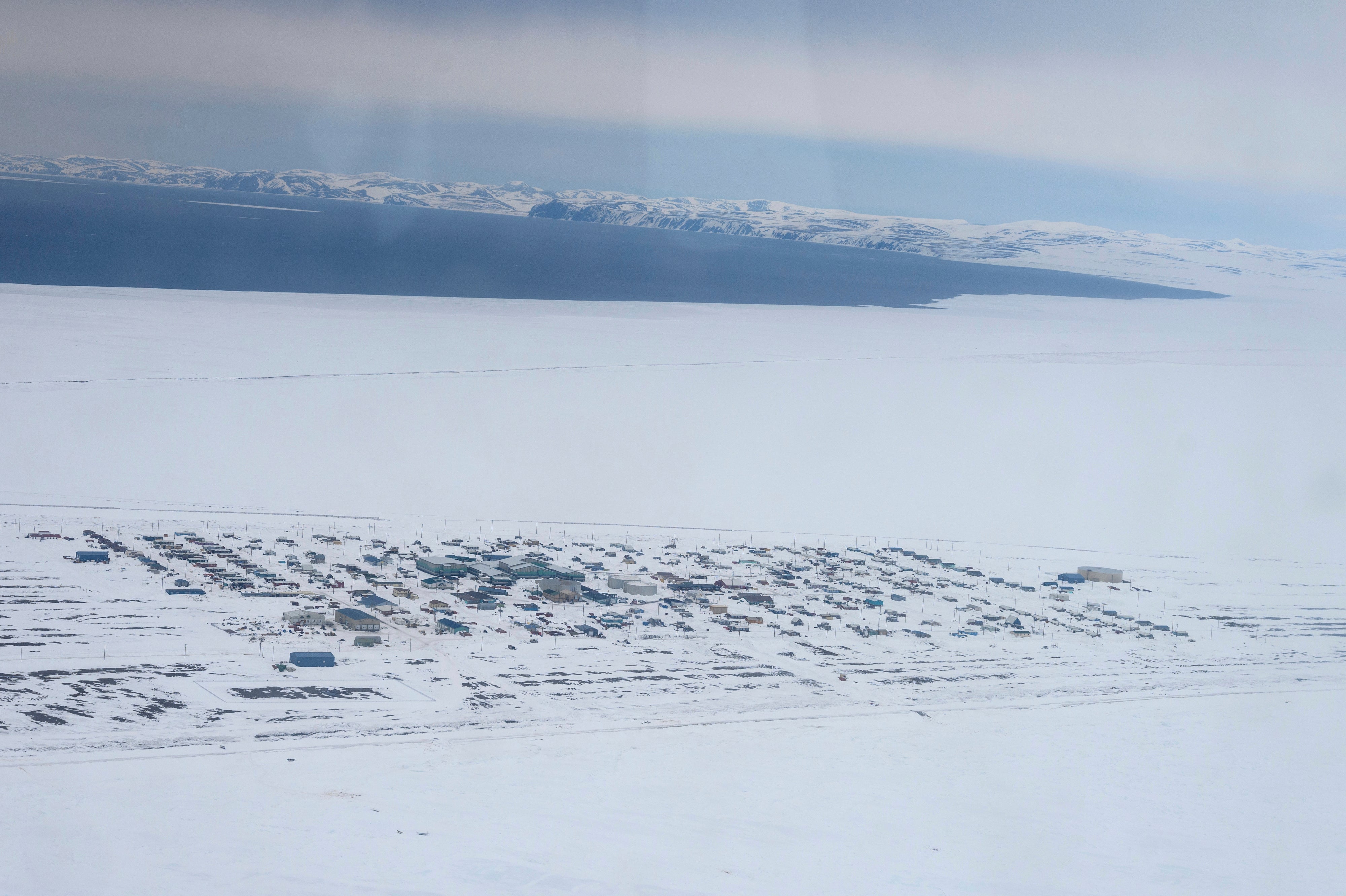 <p>An aerial view of the northwest Alaska village of Point Hope, on the Chukchi Sea, on 13 May 2023 </p>