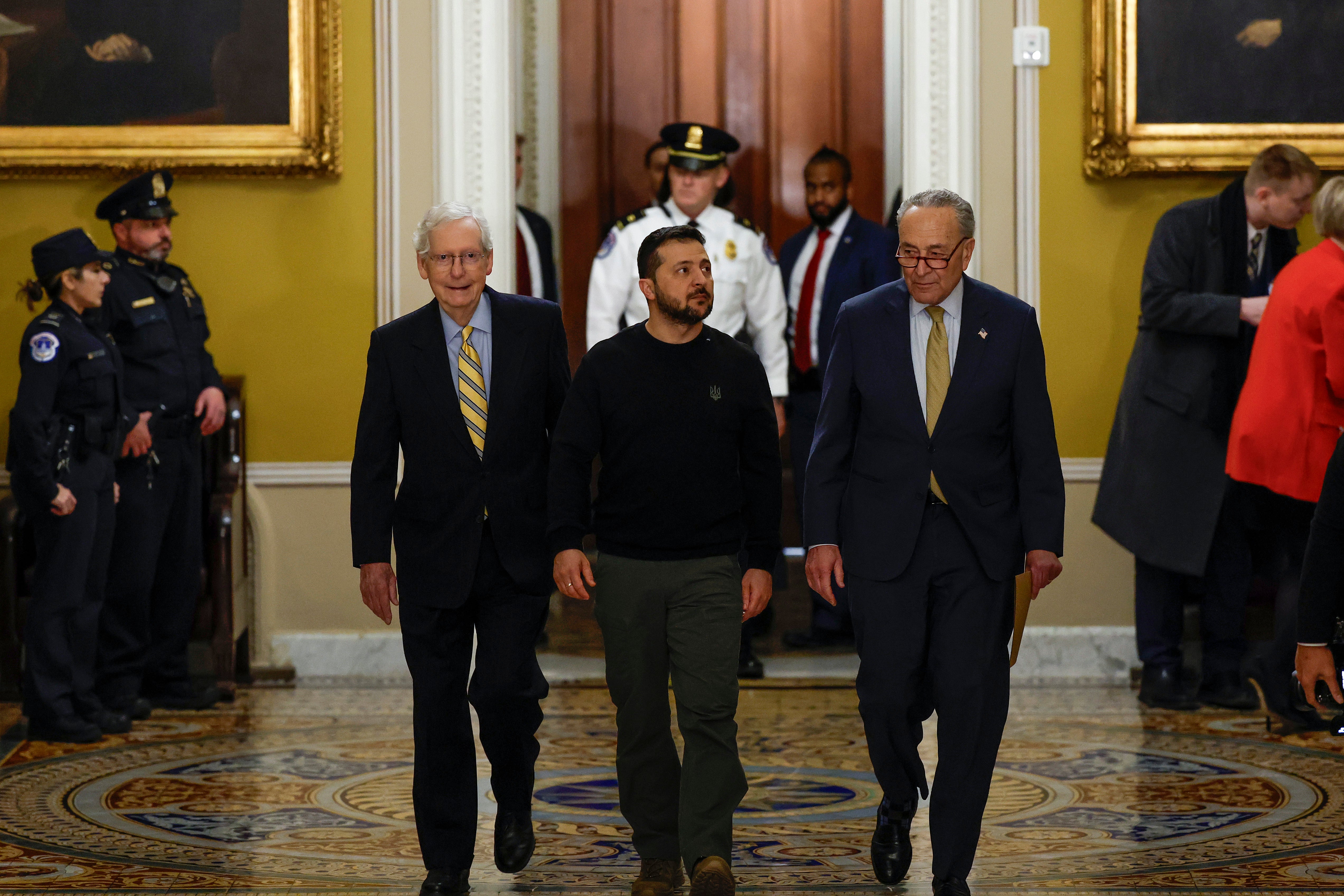 Senate Minority Leader Mitch McConnell (R-KY) (L) has been a major partner with Senate Majority Leader Charles Schumer (D-NY) in supporting Ukrainian President Volodymyr Zelensky (C) (Photo by Anna Moneymaker/Getty Images)
