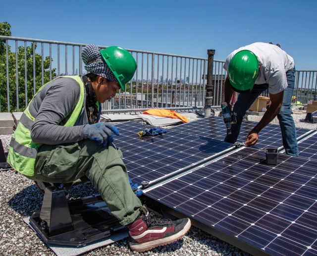 <p>Solar power installed at NYCHA buildings. New York City is set to roll out 260,000 “green-collar” jobs in the next 15 years</p>