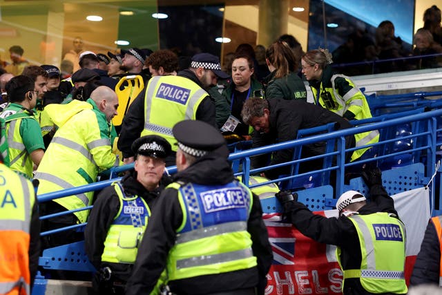 <p>A Leeds fan received treatment in the stands during the FA Cup clash</p>