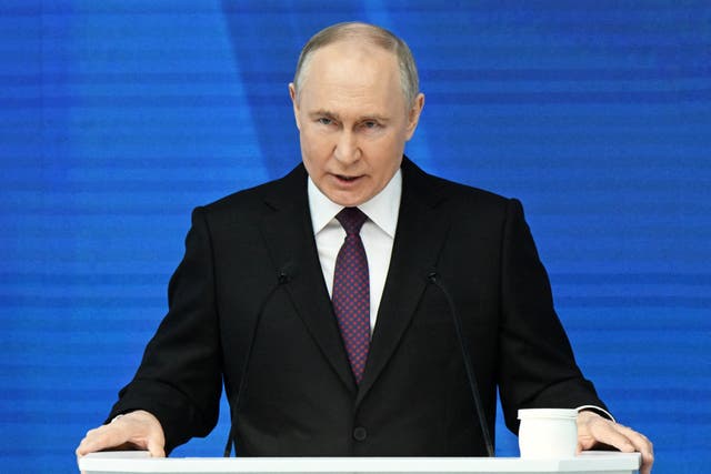 <p>Russian President Vladimir Putin delivers his annual address to the Federal Assembly, in Moscow</p>