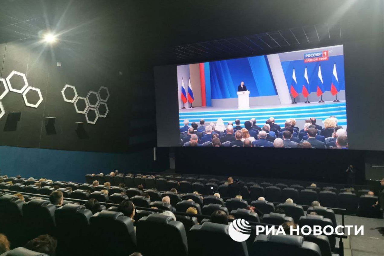Russian civilians watch Vladimir Putin’s address from a cinema in Volgograd, 600 miles south of Moscow
