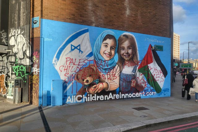 <p>The Israel-Gaza peace mural was defaced with graffiti just 16 days after it was unveiled</p>