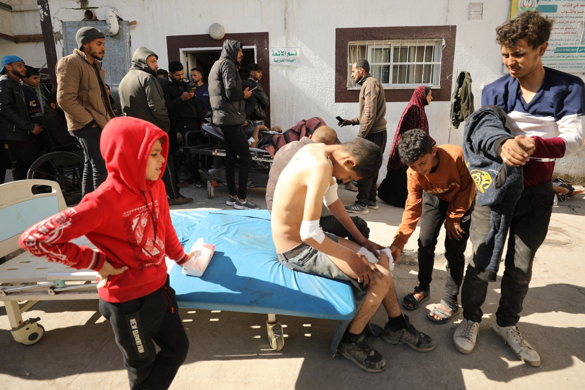 More than 100 killed in crowd waiting for aid, Gaza health officials say 