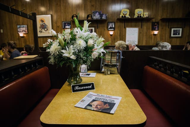 <p>The booth in Holsten’s restaurant where the final scene of The Sopranos was filmed, photographed after the death of James Gandolfini in 2013</p>