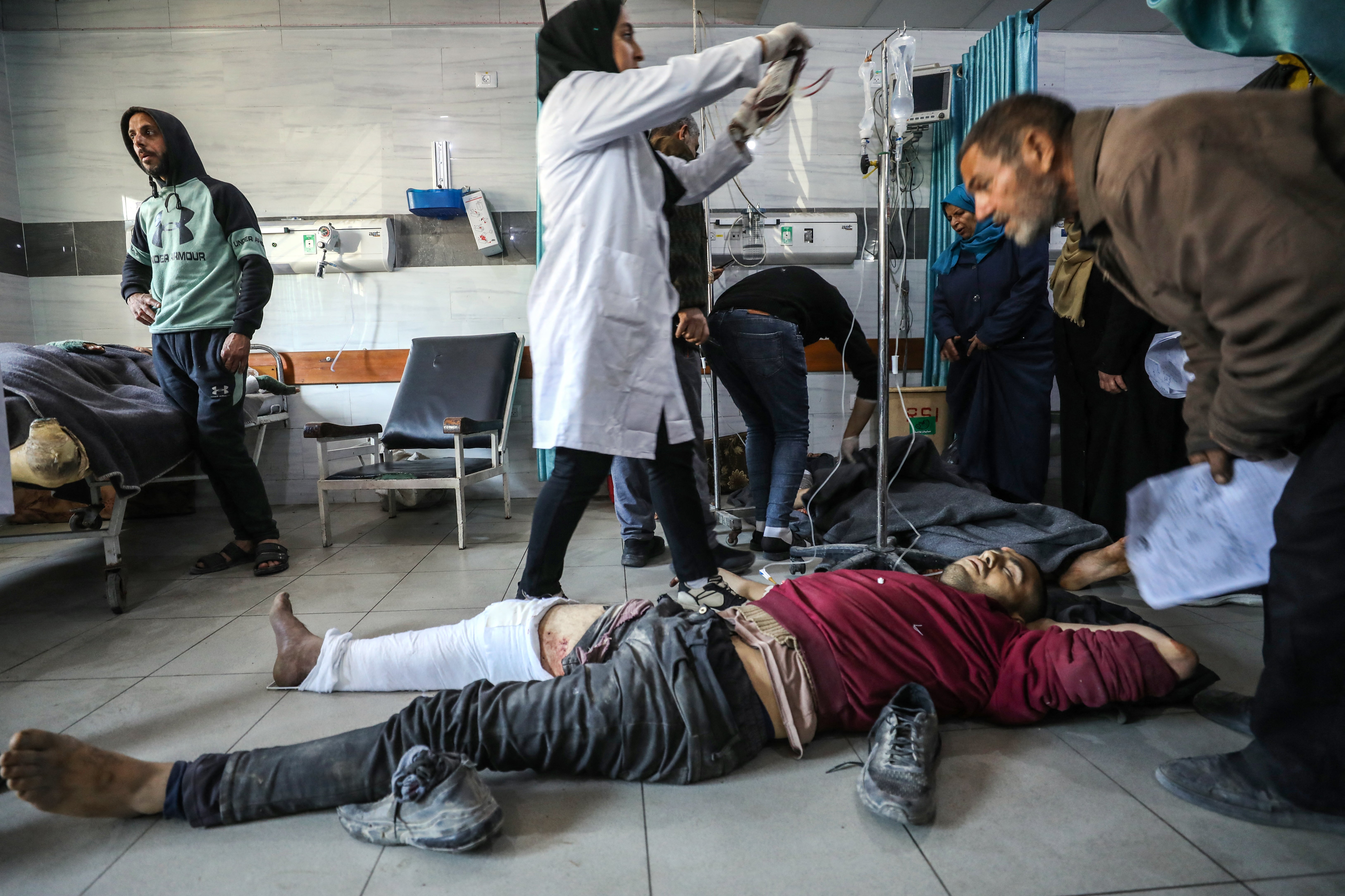 Palestinians receive medical care at Kamal Edwan Hospital in Beit Lahia, in the northern Gaza Strip, after Israeli forces opened fire on an aid truck convoy