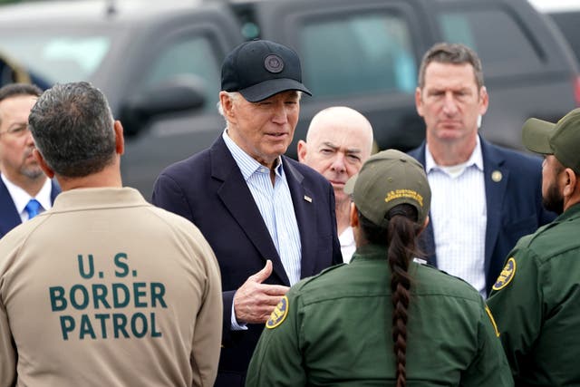<p>President Joe Biden, flanked by Homeland Security Secretary Alejandro Mayorkas, receives a briefing at the US-Mexico border in Brownsville, Texas</p>