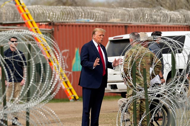 <p>Donald Trump speaks as he arrives for a visit to the US-Mexico border on 29 February 2024</p>