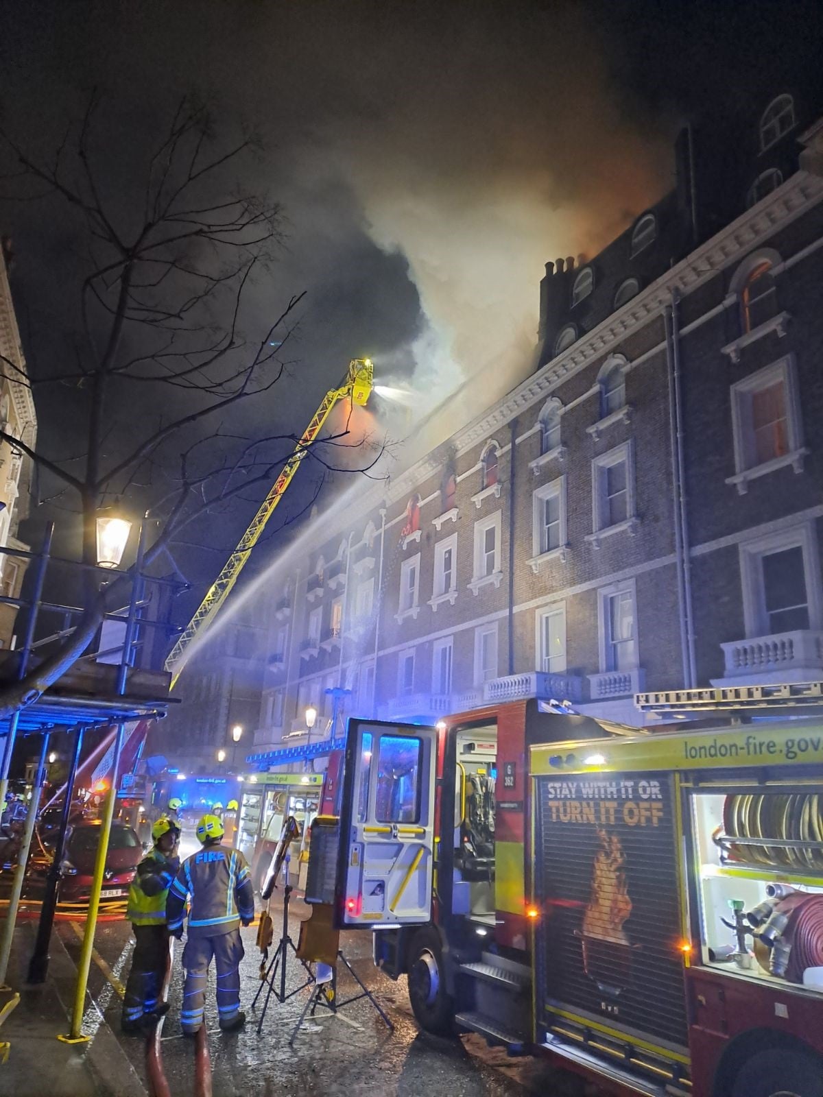 Firefighters battle the blaze inside the terraced house in South Kensington