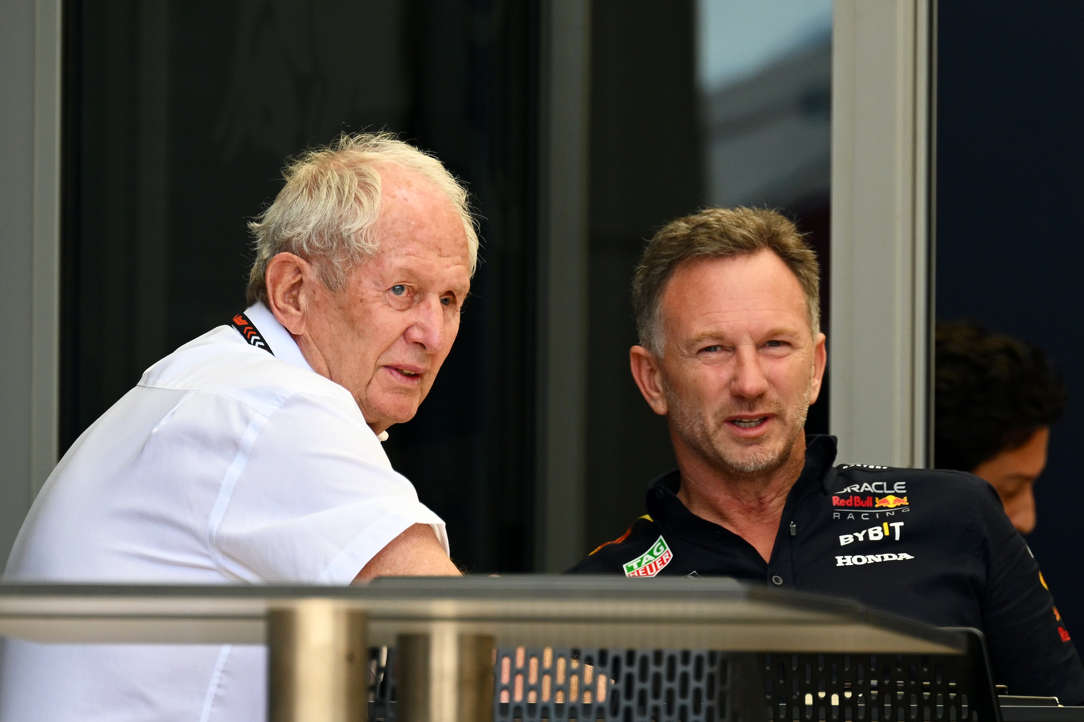 Helmut Marko conversing with Christian Horner in Bahrain