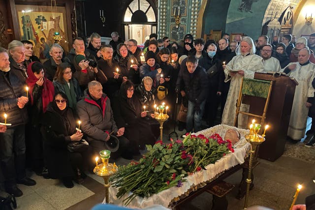 <p>Relatives and friends pay their last respects at the coffin of Russian opposition leader Alexei Navalny</p>