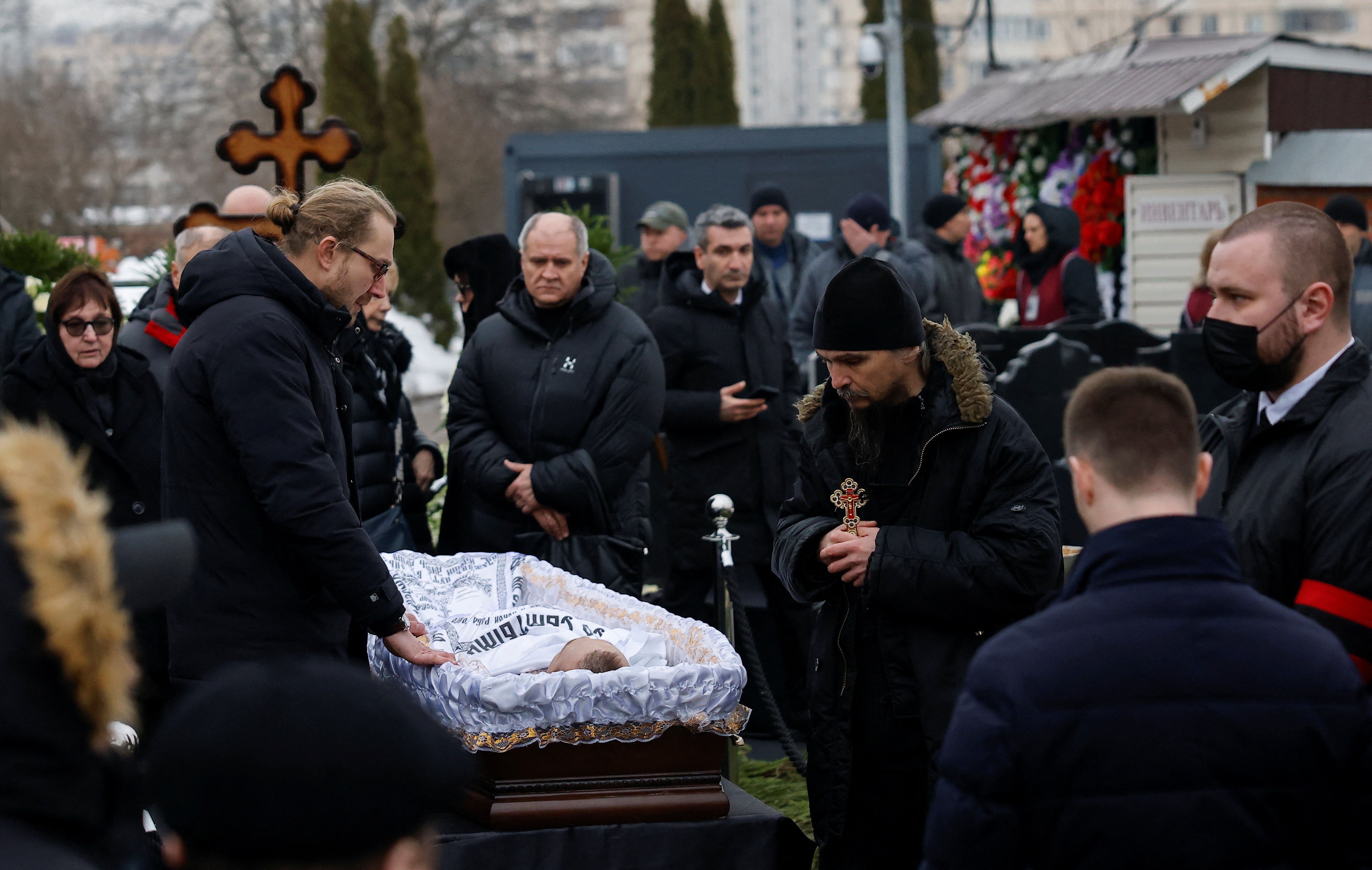 People attend the funeral of Russian opposition politician Alexei Navalny at the Borisovskoye cemetery in Moscow, on Friday