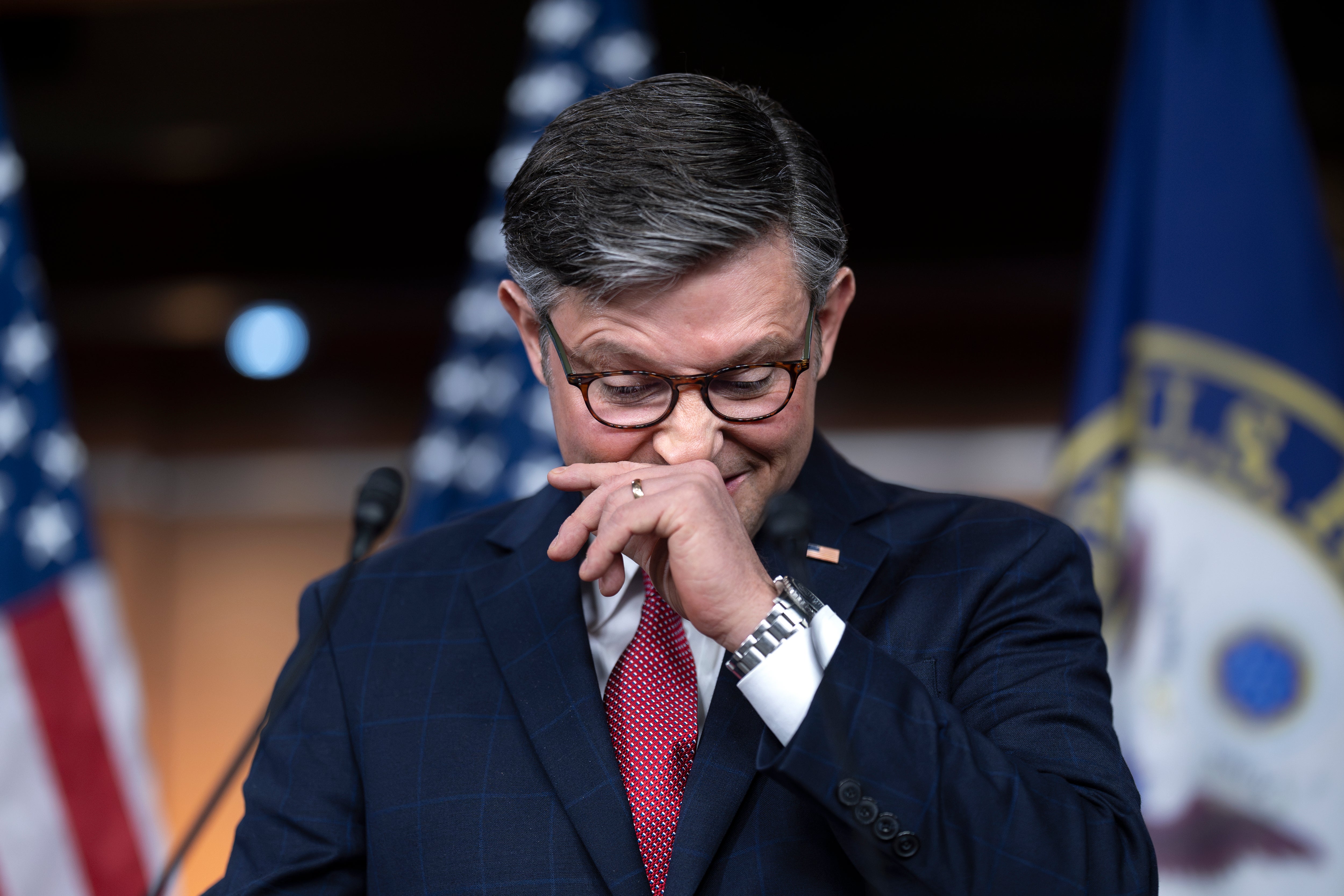 <p>House Speaker Mike Johnson talks to reporters on 29 February. </p>