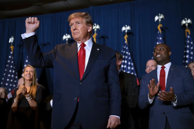 <p>FEBRUARY 24: Republican presidential candidate and former President Donald Trump gestures to supporters during an election night watch party at the State Fairgrounds on February 24, 2024 in Columbia, South Carolina. </p>