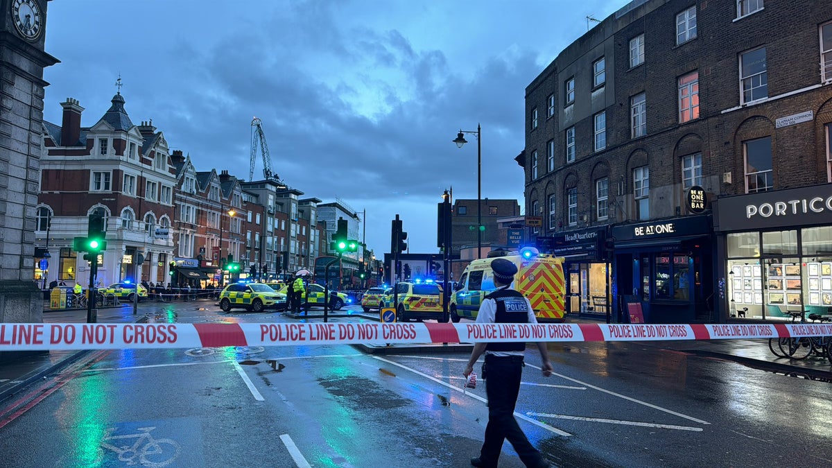 Clapham shooting - live: Three injured after gunman opens fire outside pub as police hunt suspect