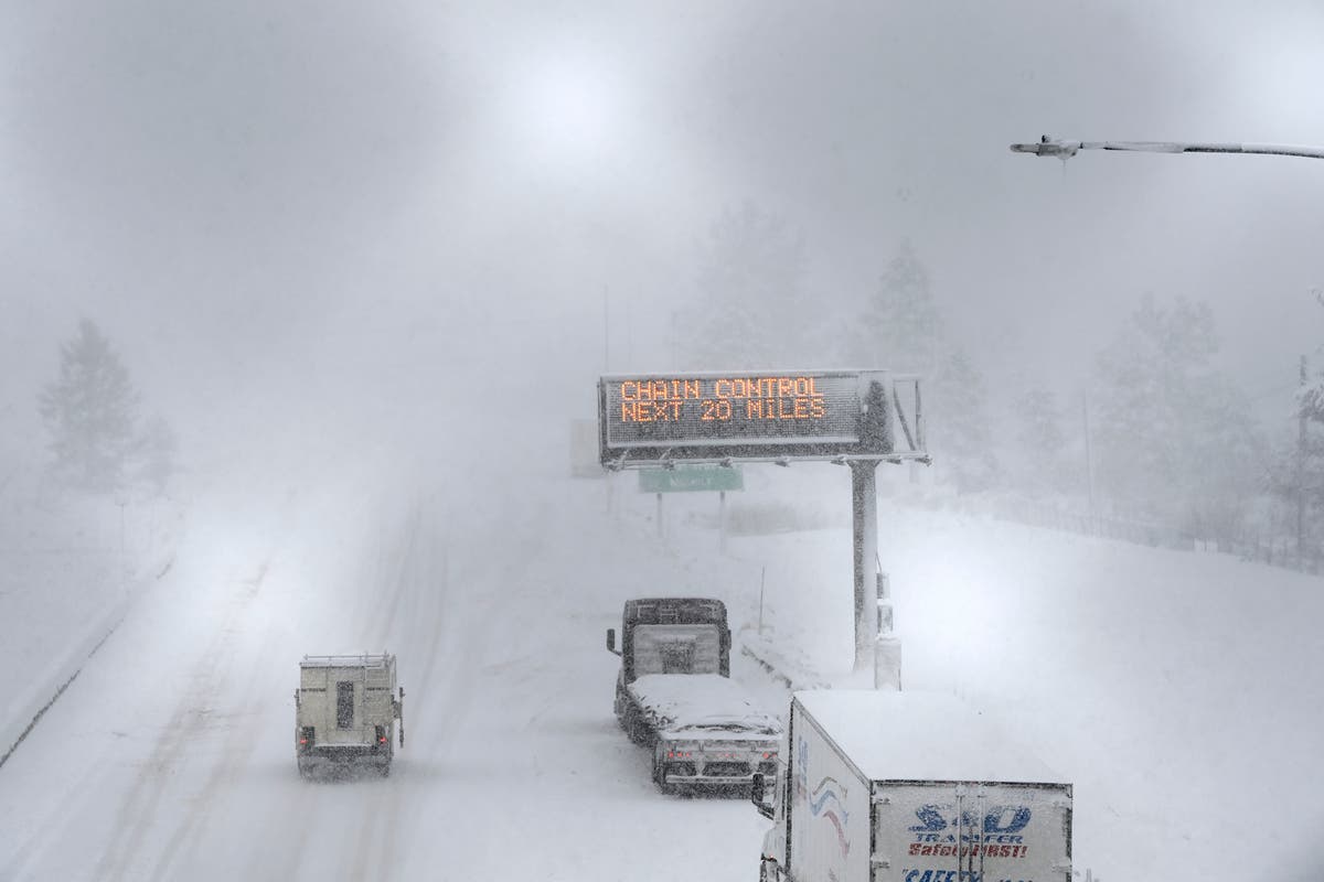 Powerful storm in California and Nevada shuts interstate and dumps snow on mountains