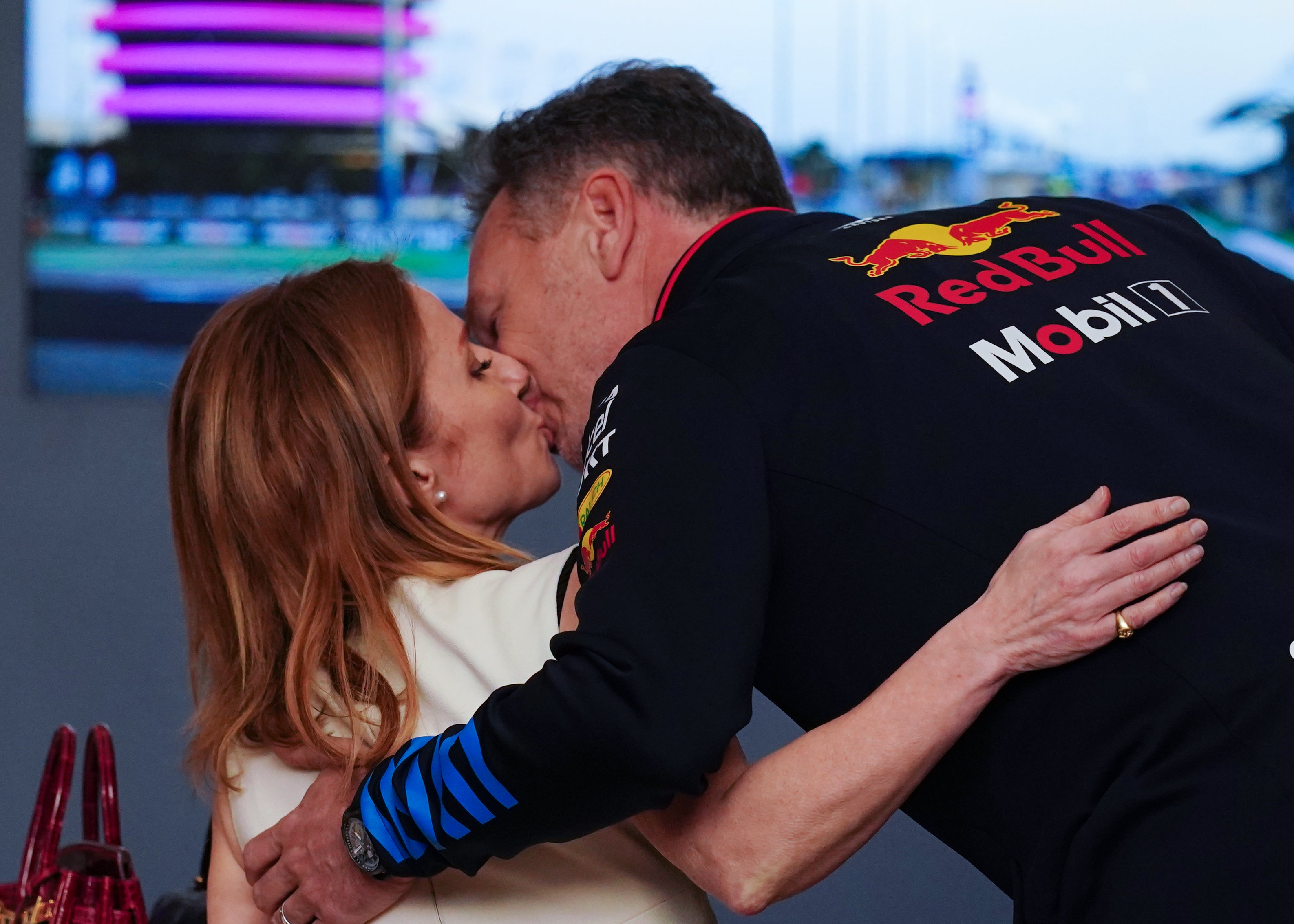 Christian and Geri Horner share a kiss before the Bahrain Grand Prix