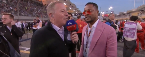 <p>Martin Brundle talking to Patrice Evra on the F1 grid in Bahrain </p>