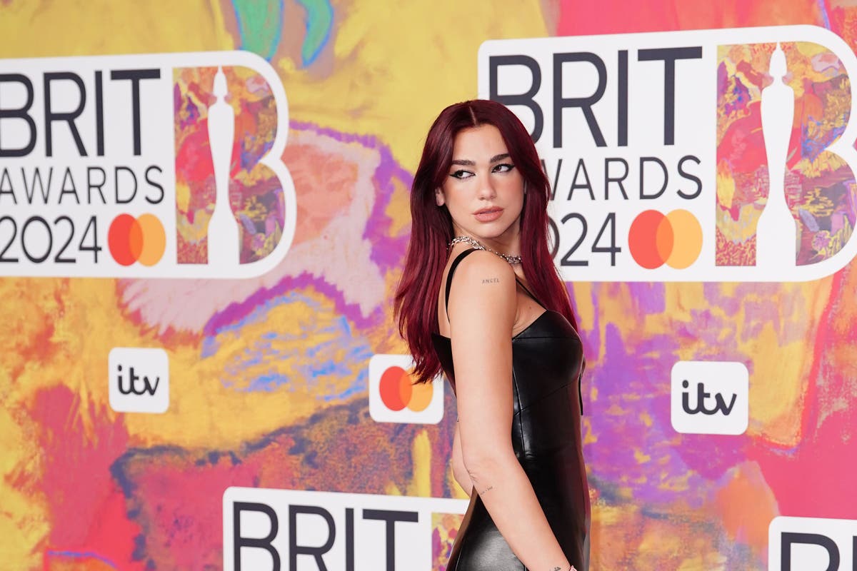 Dua Lipa leads charge of racy black gowns on Brit Awards red carpet ...