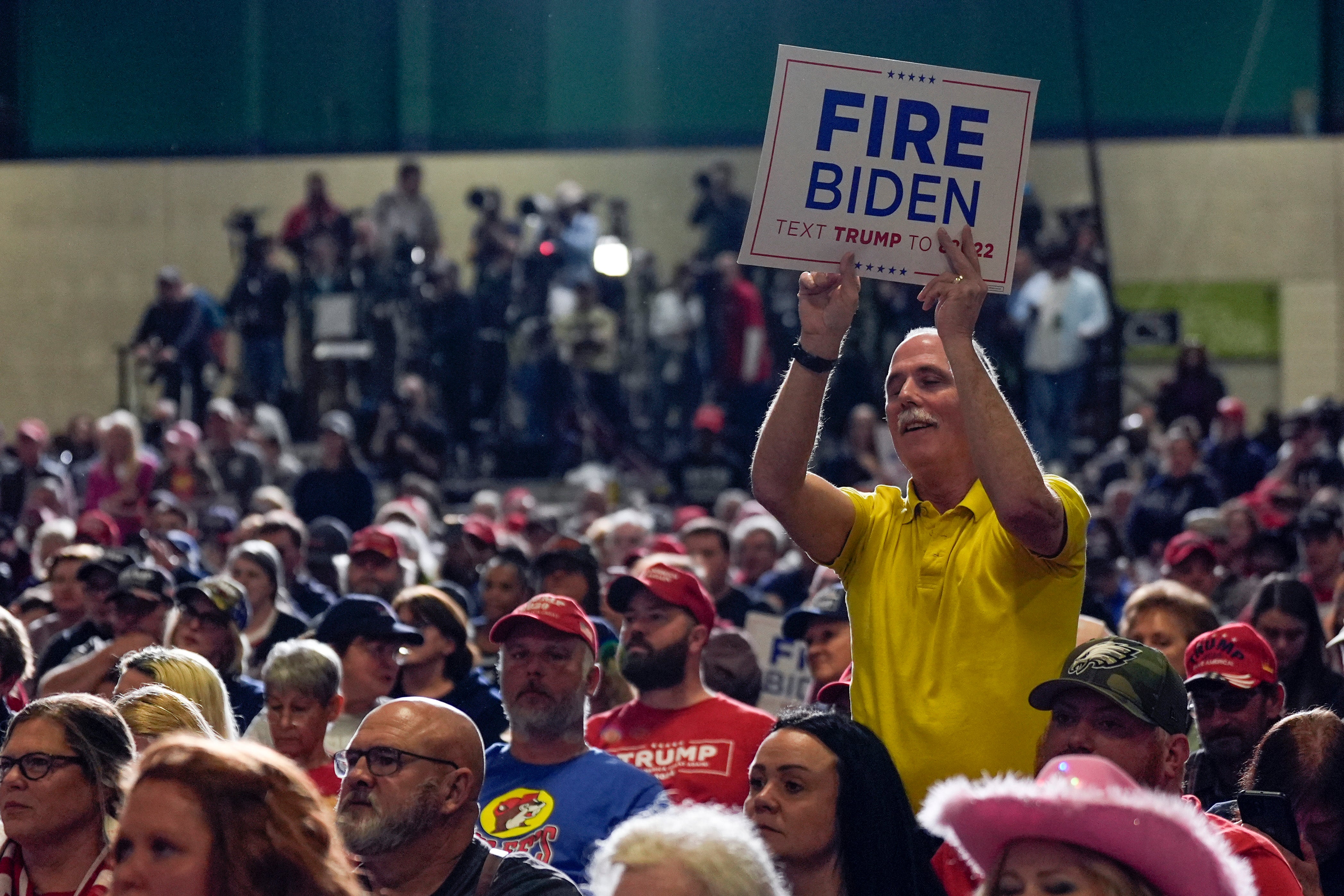 A supporter holds a sign as Republican presidential candidate former President Donald Trump speaks at a campaign rally Saturday, March 2, 2024, in Greensboro, N.C