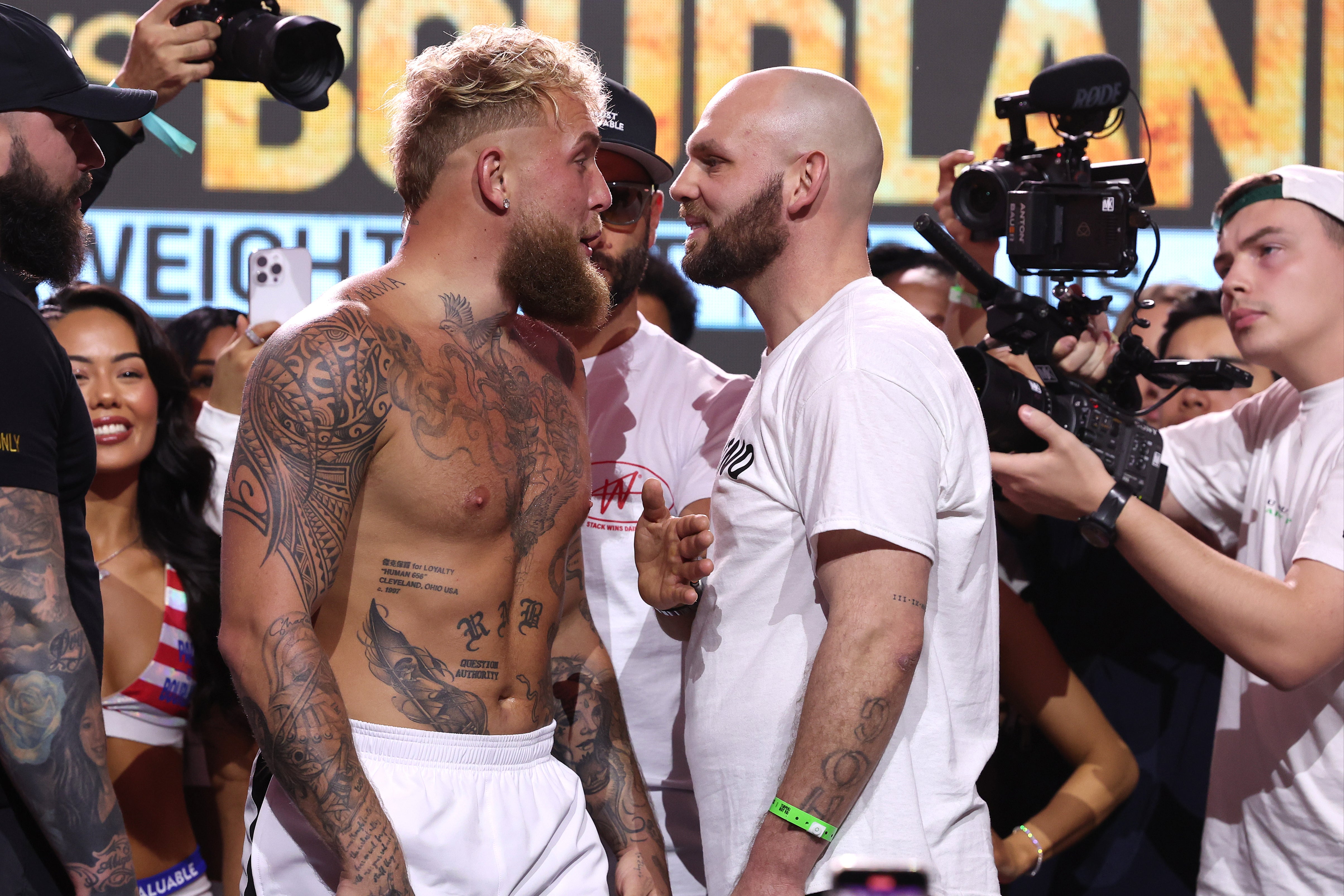 Jake Paul (left) and Ryan Bourland face off during their weigh-in