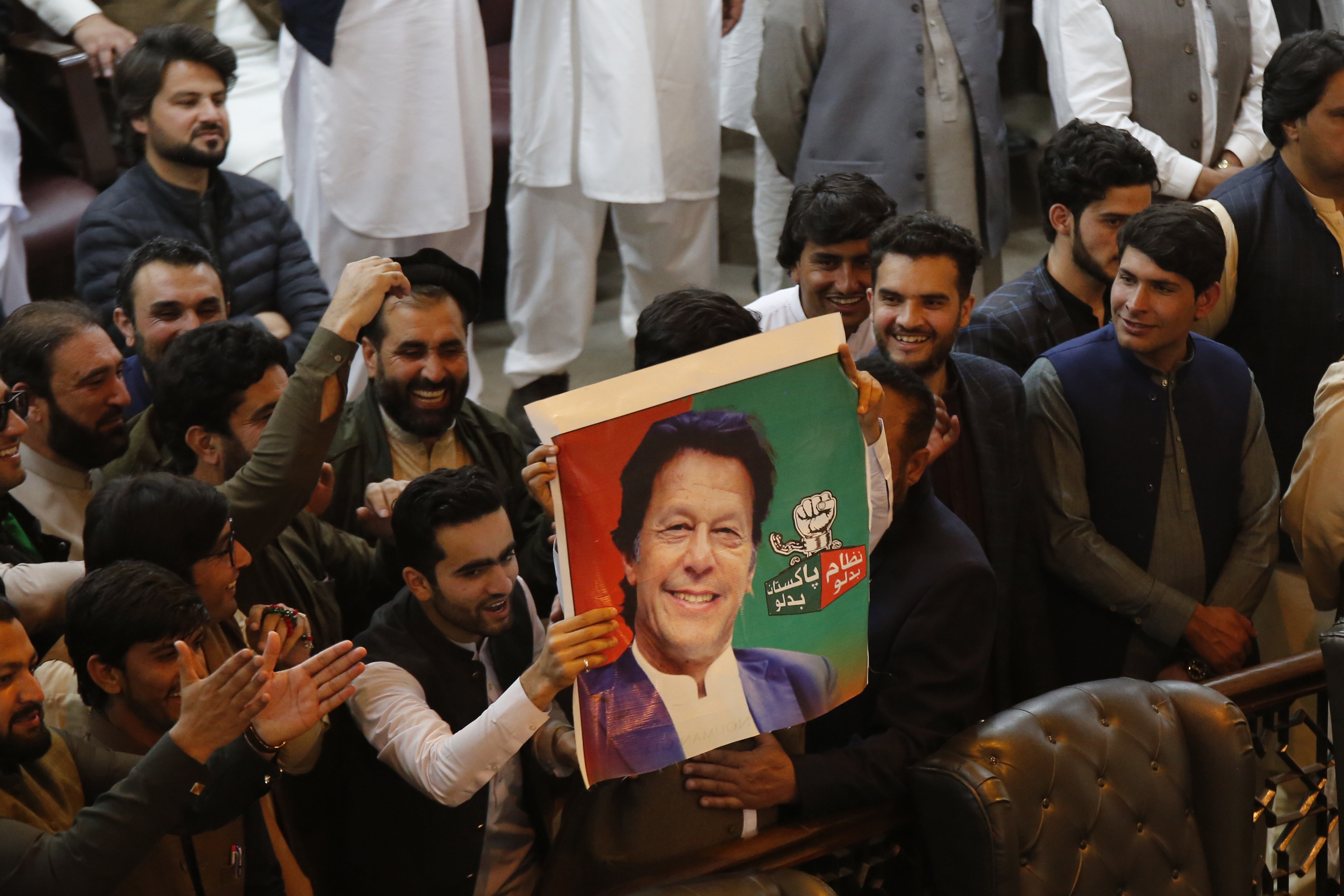 Supporters of convicted former prime minister Imran Khan attend the KPK provincial assembly oath-taking session of newly elected members, in Peshawar, Pakistan