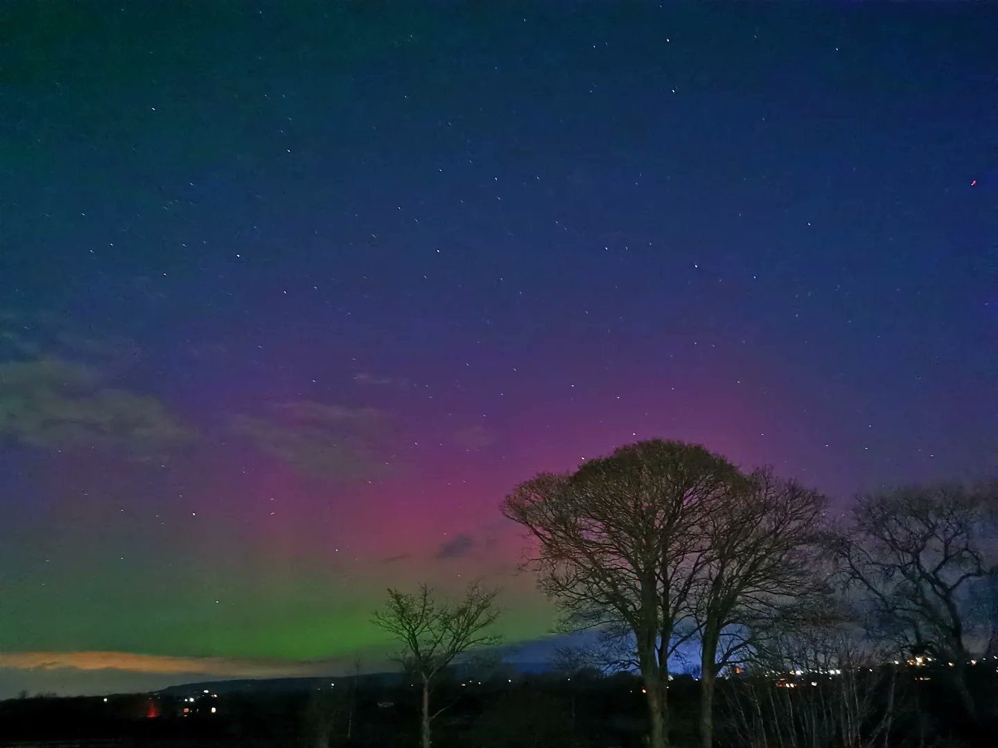 The aurora borealis, also known as the northern lights, over Grimsargh Wetlands in Lancashire