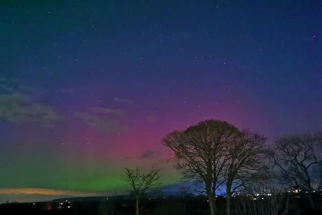 <p>The aurora borealis, also known as the northern lights, over Grimsargh Wetlands in Lancashire</p>