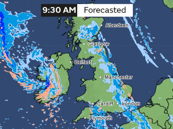 Met Office forecast shows rainfall and snow forecast for Tuesday morning, with a band of rain seen covering eastern parts of the country in blue while some snow and frost can be seen in the north