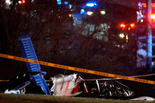 <p>Debris from a fatal small plane crash is seen alongside Interstate 40 near mile marker 202 in Nashville</p>