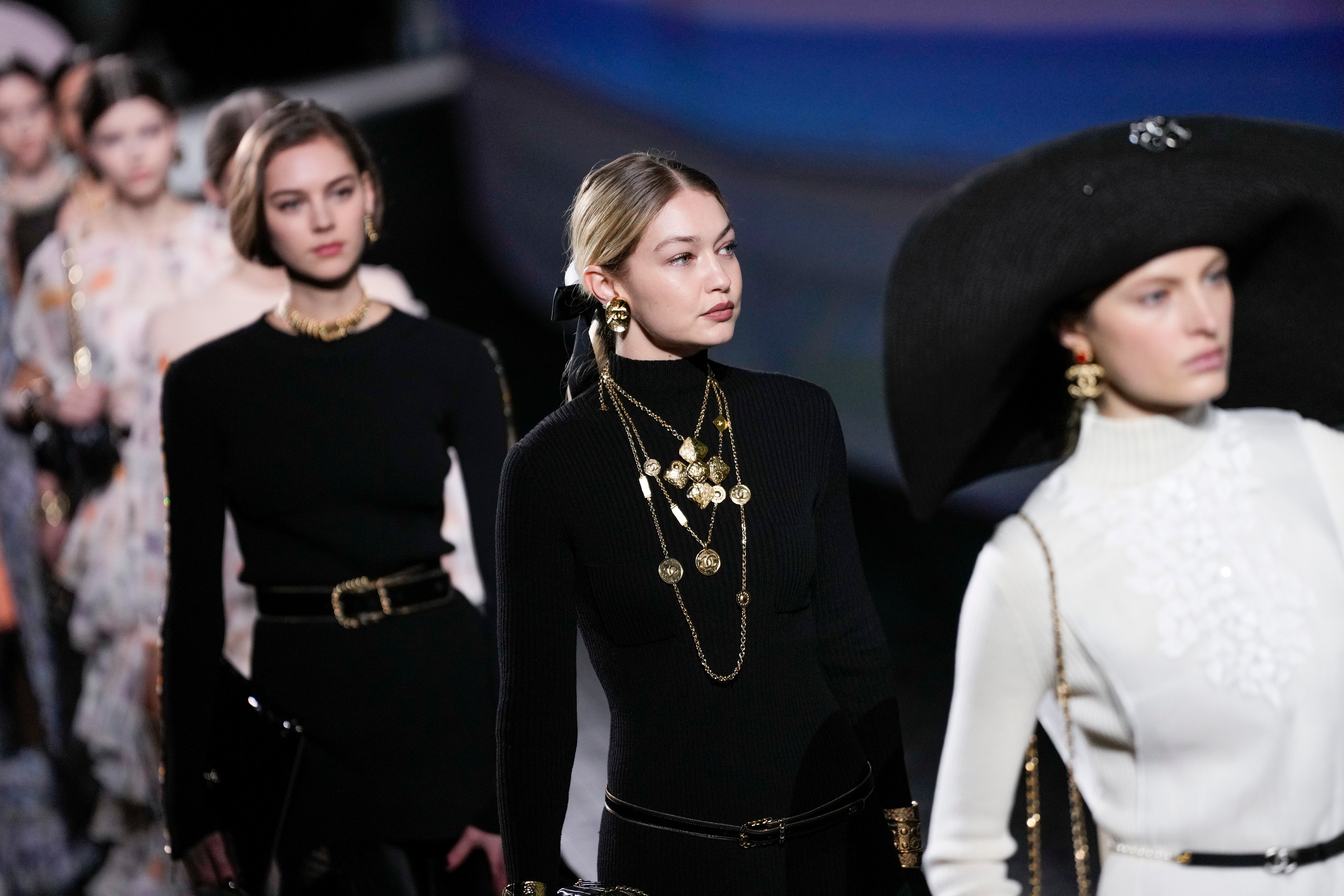 Oversized hats dominated the Chanel runway (Scott A Garfitt/AP)
