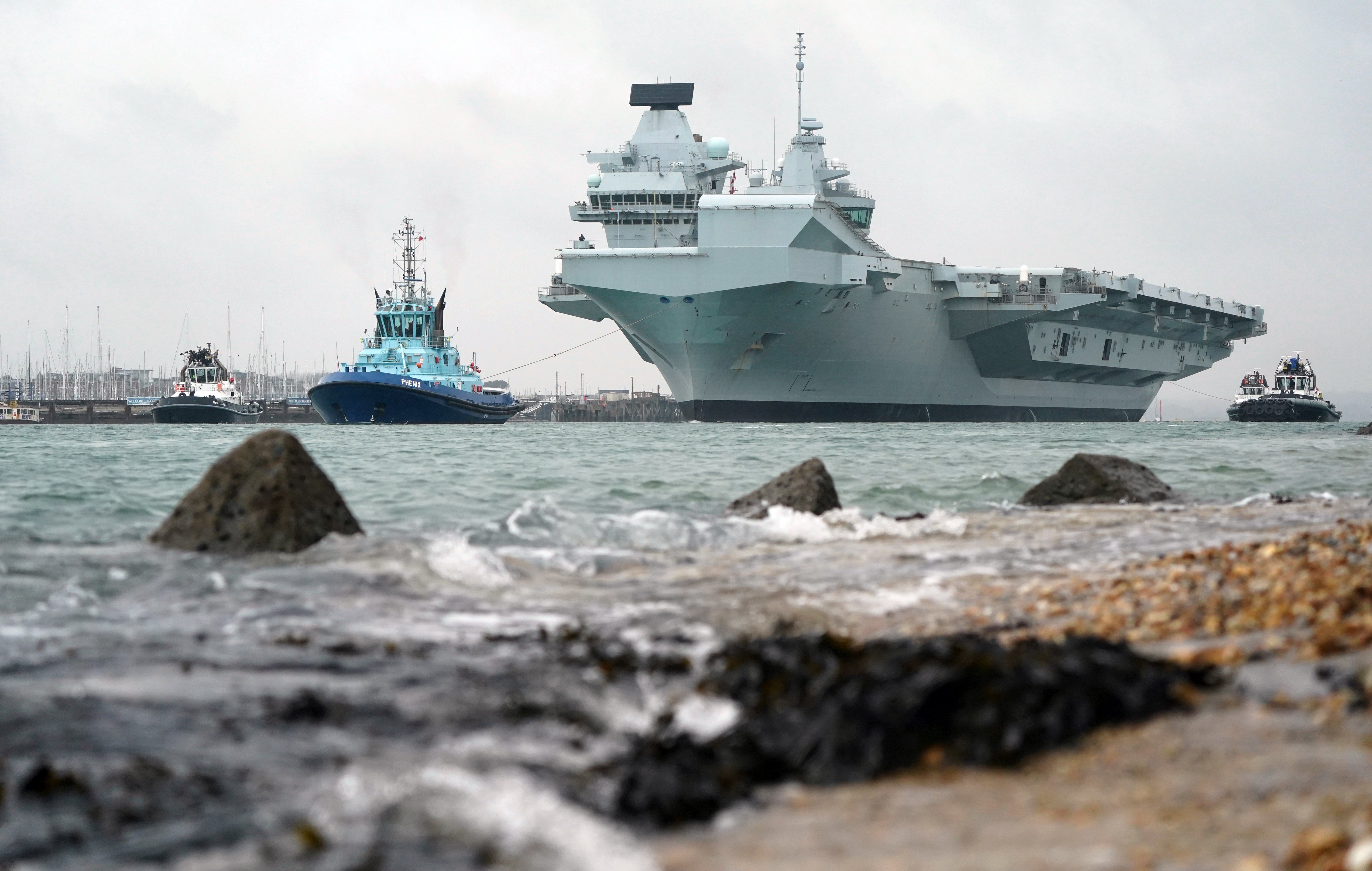 The Royal Navy aircraft carrier HMS Queen Elizabeth leaves Portsmouth Harbour