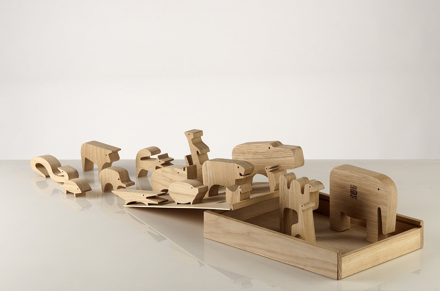 16 Animals , a wooden puzzle, was created by Mari in 1957