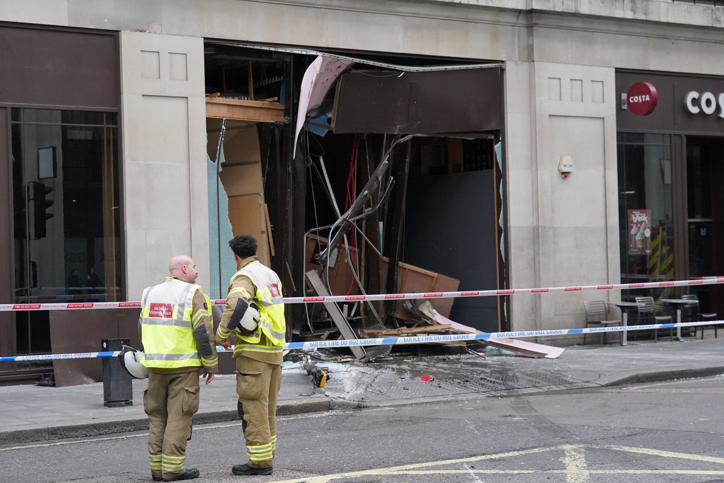 The damage left by the bus crashing into the building