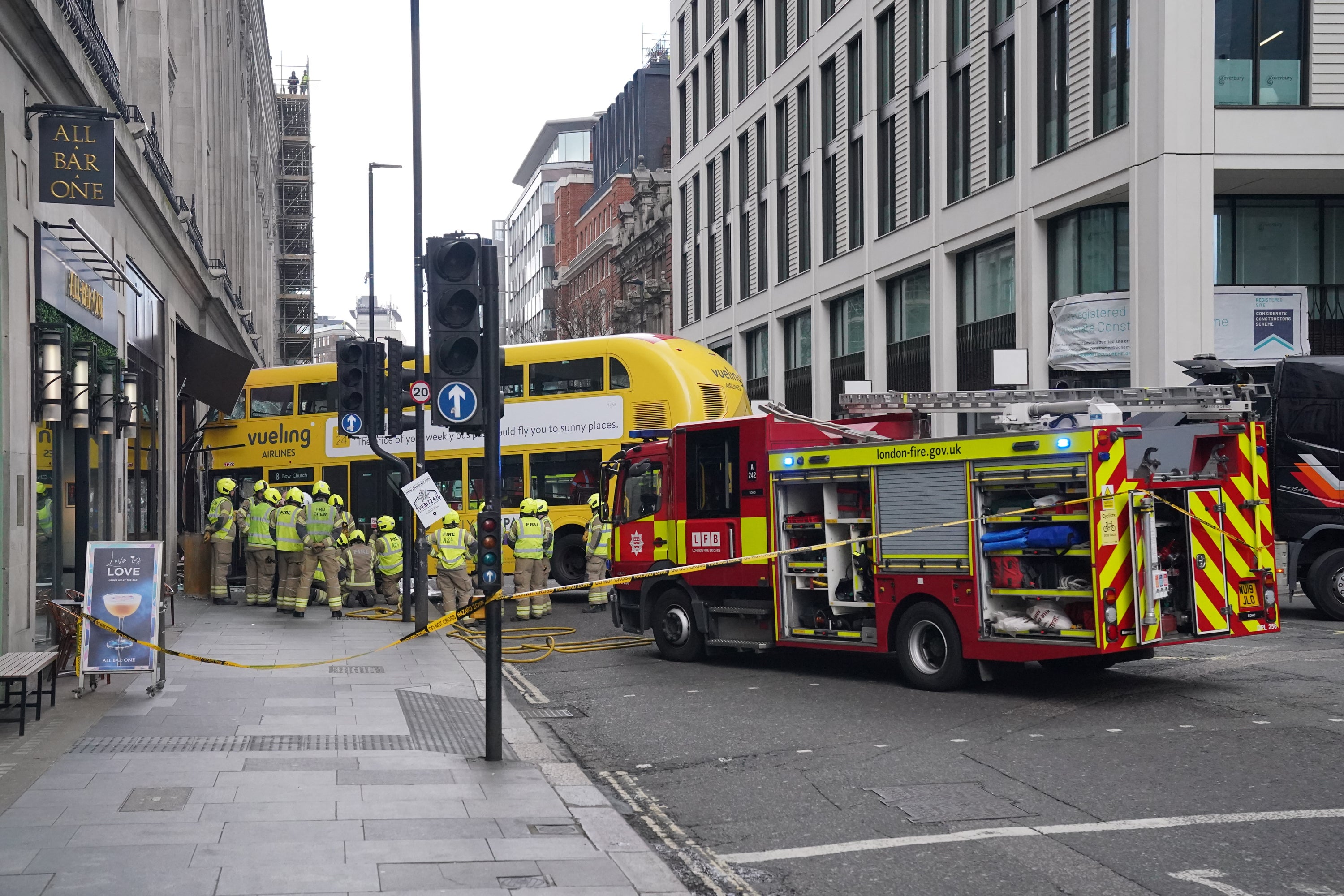 Emergency workers at the scene of a bus crash in New Oxford Street